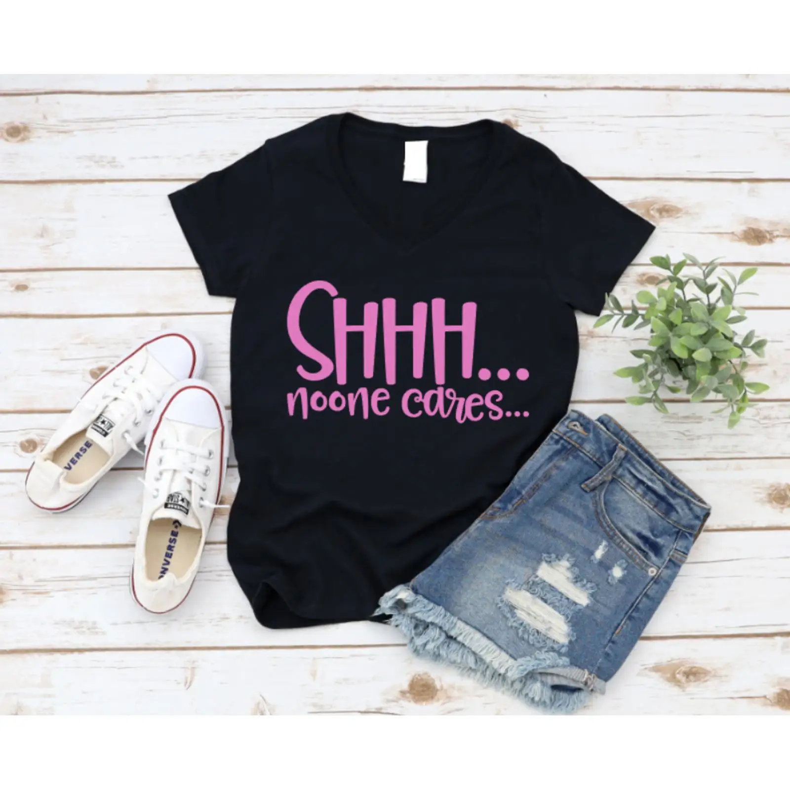 Schwarzes T-Shirt mit rosa Sch – On Sneaker Care Bewertung und Preis